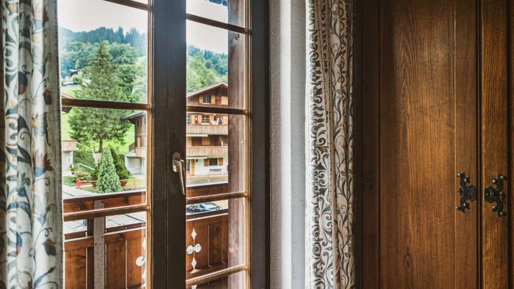Balkón nebo terasa v ubytování Hotel Gletscherblick Grindelwald