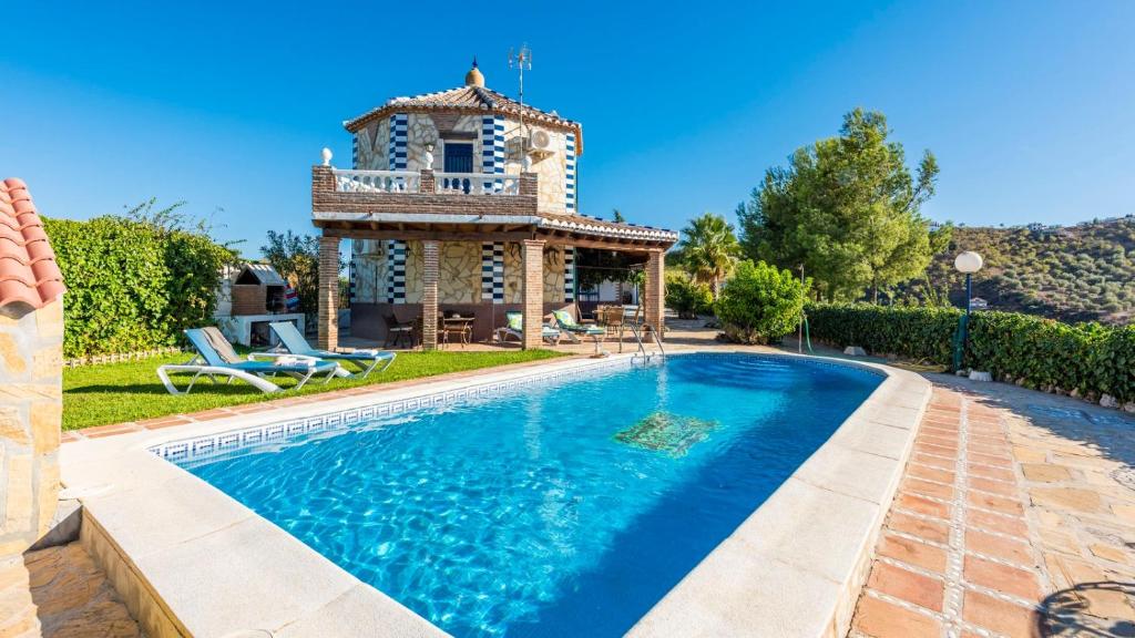 Bazén v ubytování Casa La Noria Iznate by Ruralidays nebo v jeho okolí
