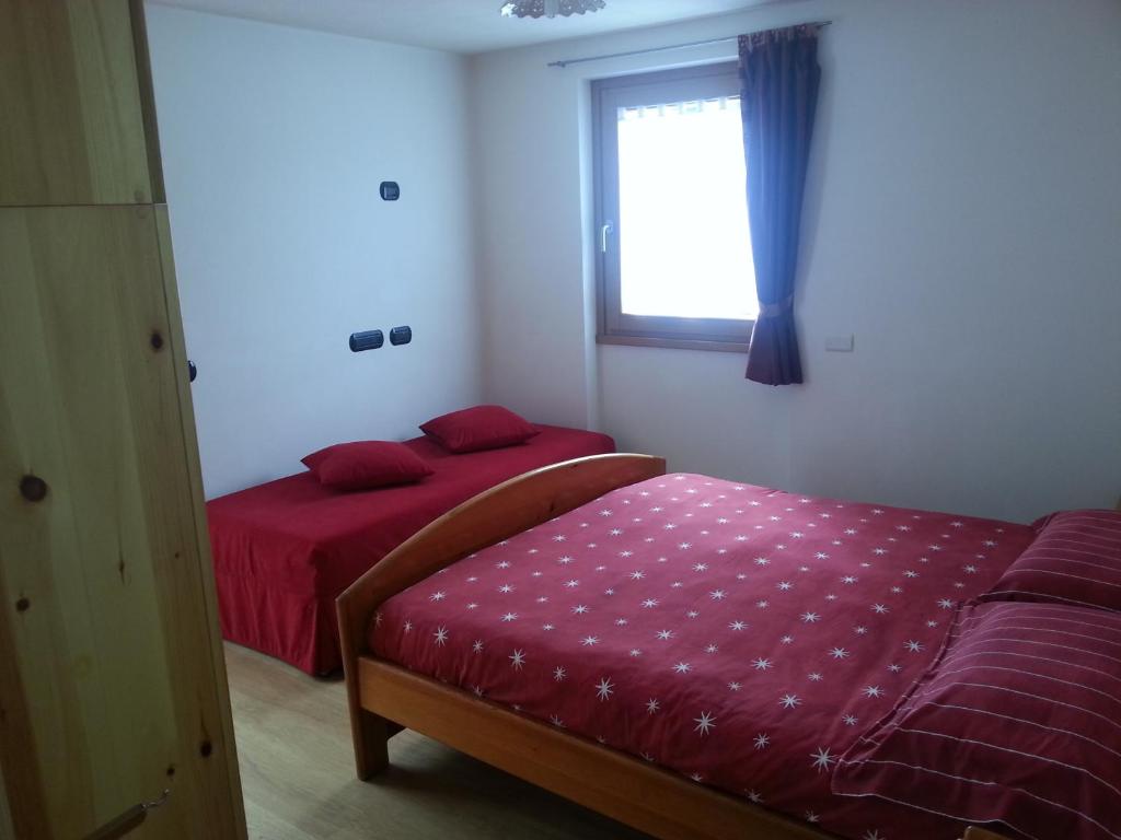 Postel nebo postele na pokoji v ubytování Casa Betty