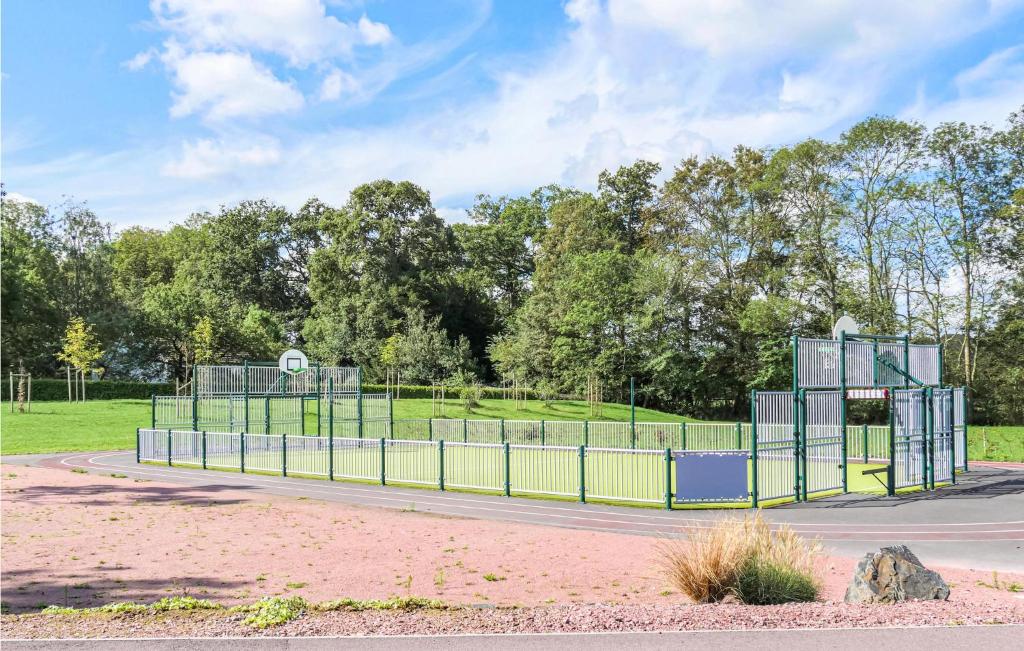 a basketball court in a park with a fence at Beautiful Home In La Meauffe With 2 Bedrooms And Wifi in La Meauffe