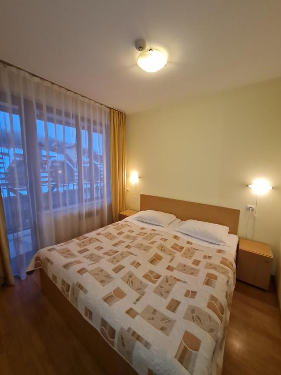 Postel nebo postele na pokoji v ubytování Studio - Apartments Castle Complex 2