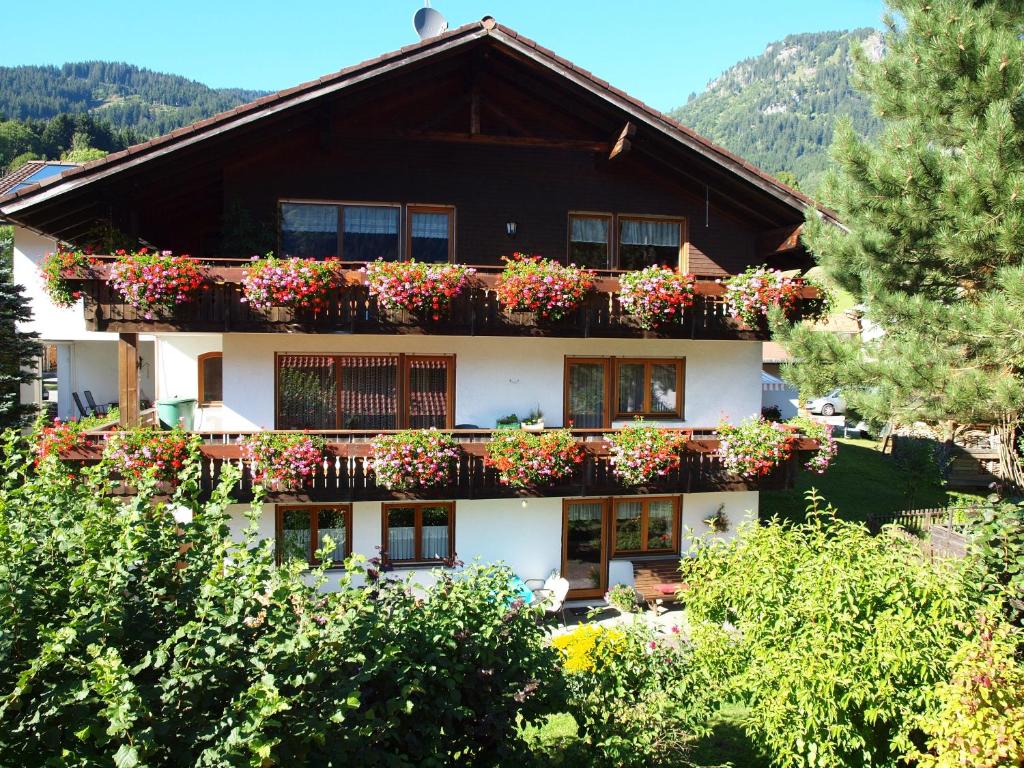 a building with flower boxes on the side of it at Haus Rosi Göhl in Bad Hindelang