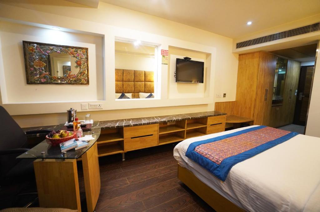 Postel nebo postele na pokoji v ubytování Airport Hotel Grand by Fantasia