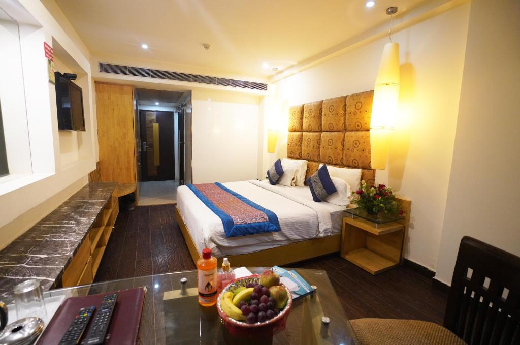 Postel nebo postele na pokoji v ubytování Airport Hotel Grand by Fantasia