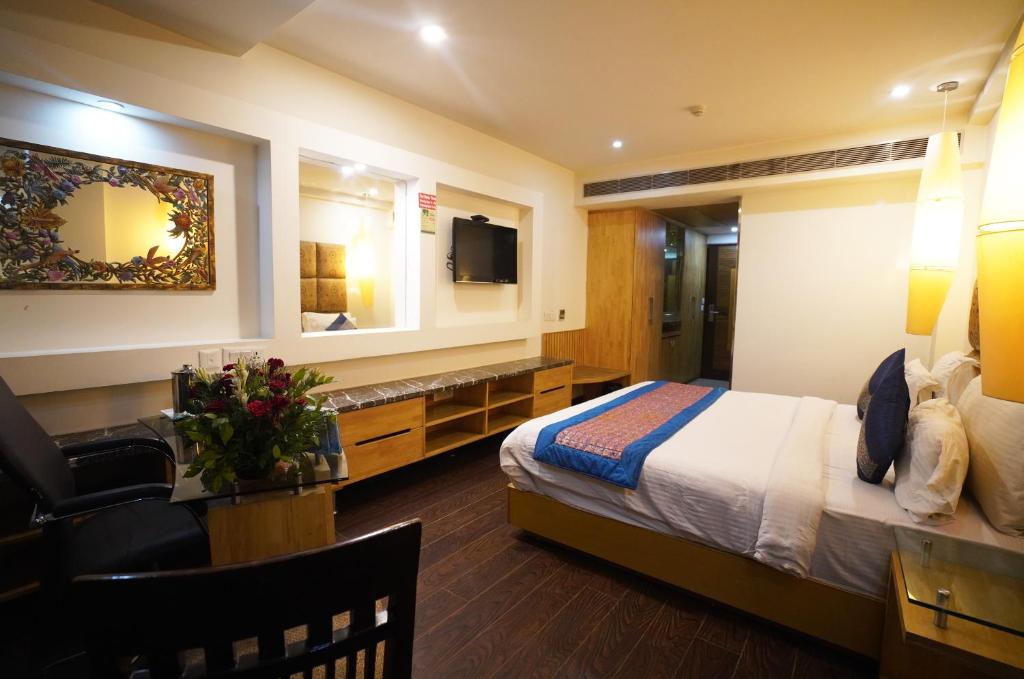 Postel nebo postele na pokoji v ubytování Airport Hotel Grand by Fantasia