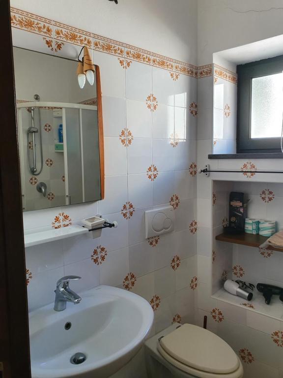 Koupelna v ubytování TORCHIO - Appartementi Il Palmento