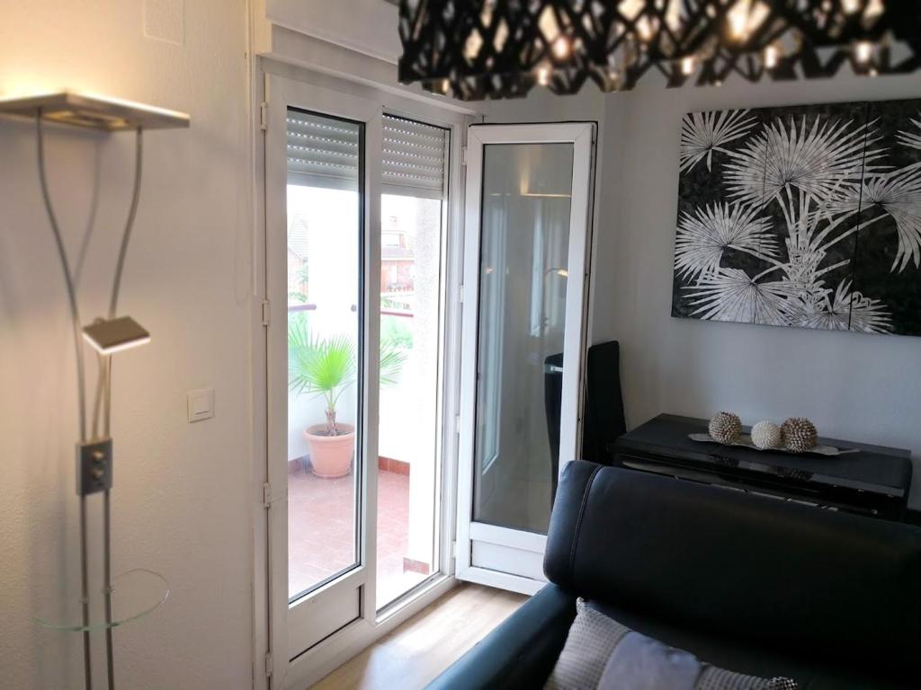 Posezení v ubytování Charming apartment in Mogro with sea and mountain views