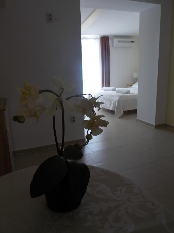 Postel nebo postele na pokoji v ubytování Rooms Valentino