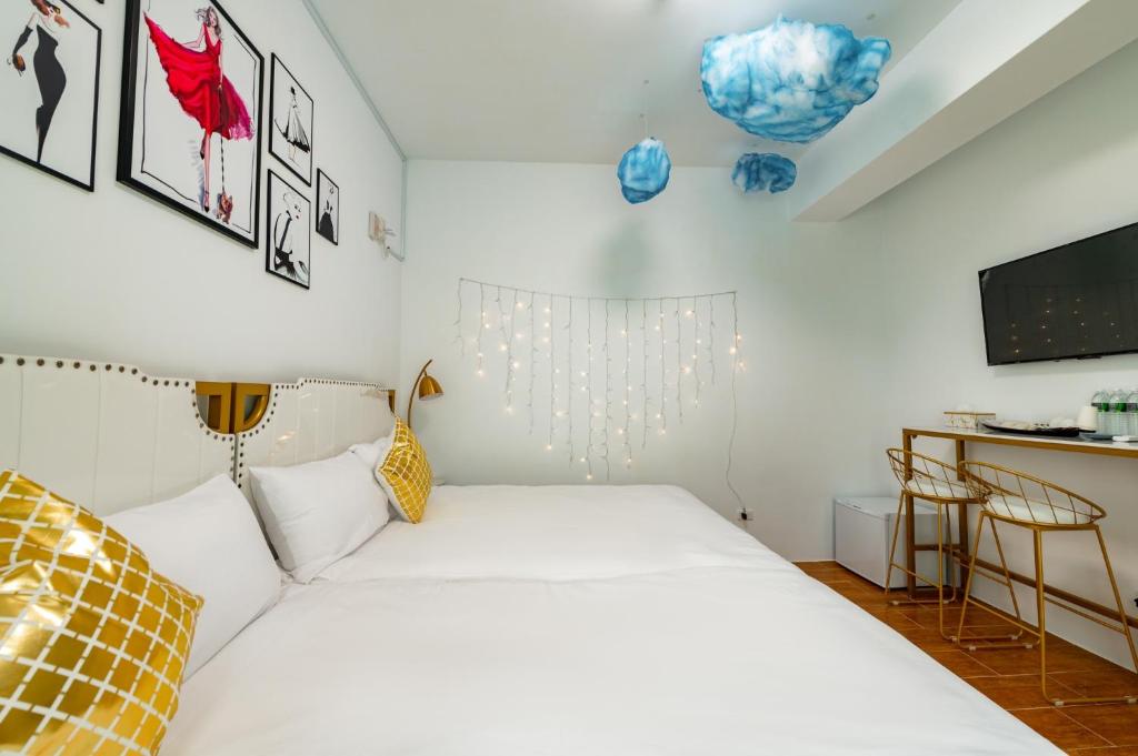 Postel nebo postele na pokoji v ubytování W Homestay