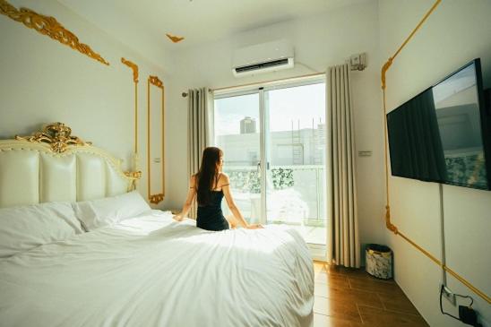 Postel nebo postele na pokoji v ubytování W Homestay