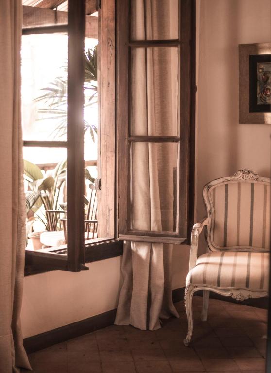 Posezení v ubytování Casa Del Val - Villa María Hotel