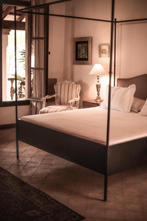 Postel nebo postele na pokoji v ubytování Casa Del Val - Villa María Hotel