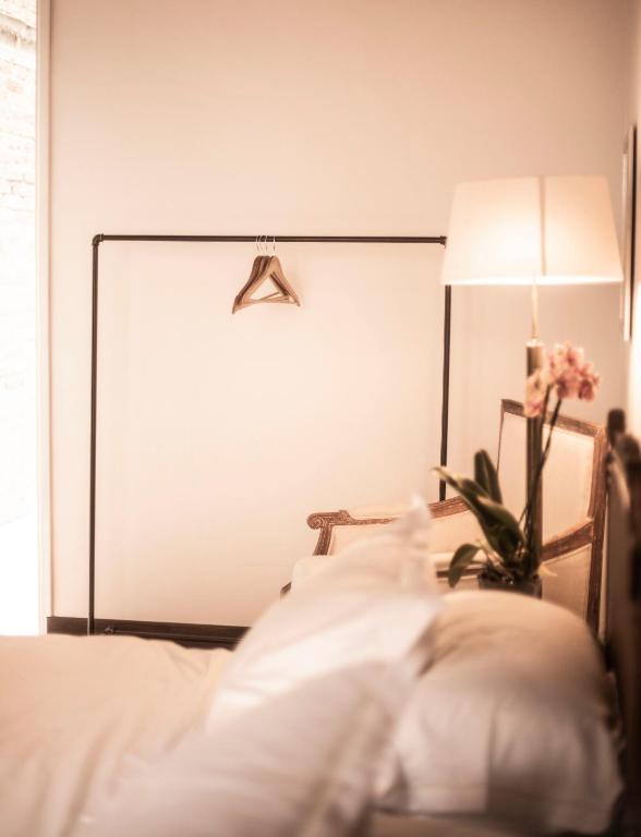 Postel nebo postele na pokoji v ubytování Casa Del Val - Villa María Hotel
