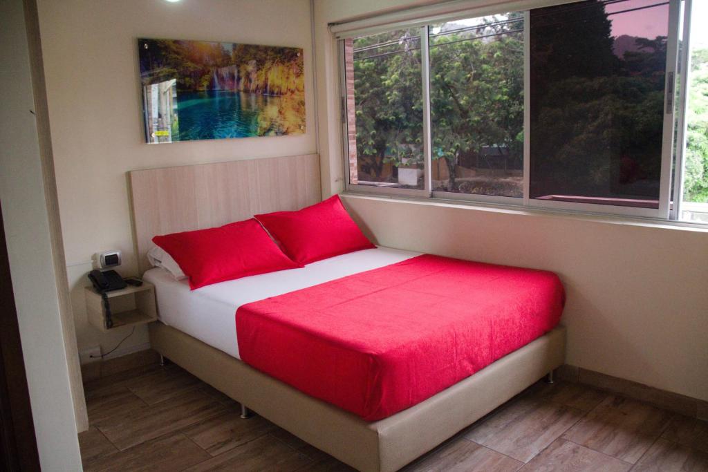 Postel nebo postele na pokoji v ubytování Hotel Boutique Street 50