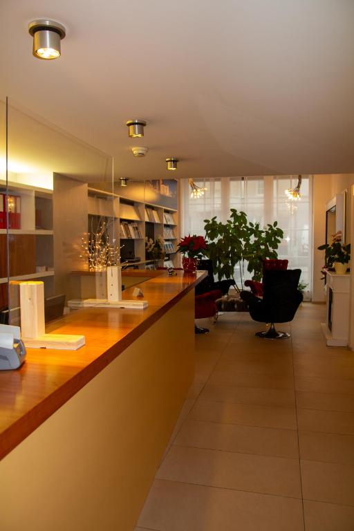 Una cocina o cocineta en Boutique City Hotel Gallo