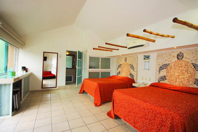 Postel nebo postele na pokoji v ubytování Bon Jesus Hotel