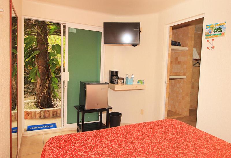 TV a/nebo společenská místnost v ubytování Bon Jesus Hotel