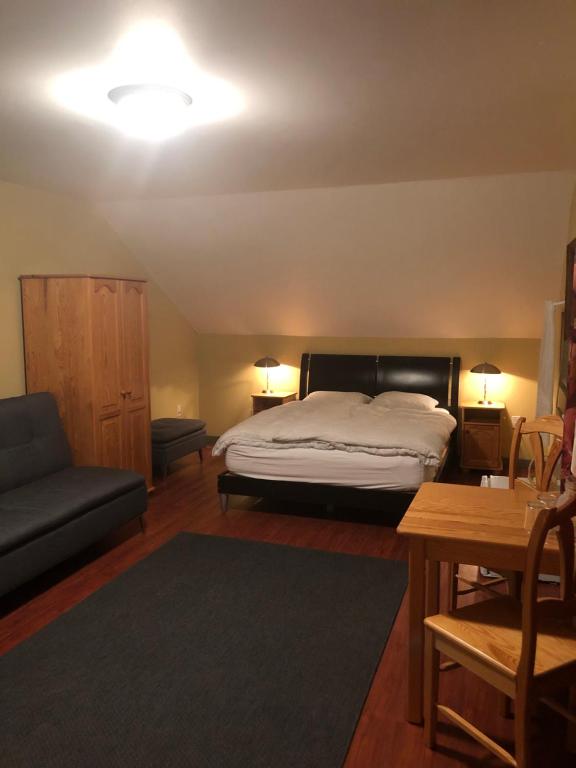 Postel nebo postele na pokoji v ubytování Crowsnest Vineyards Guesthouse