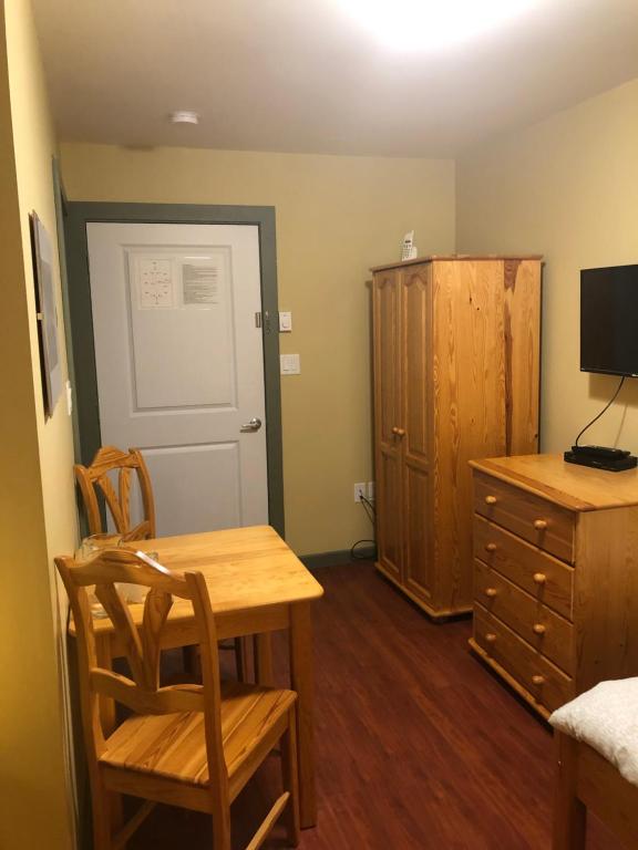 TV a/nebo společenská místnost v ubytování Crowsnest Vineyards Guesthouse
