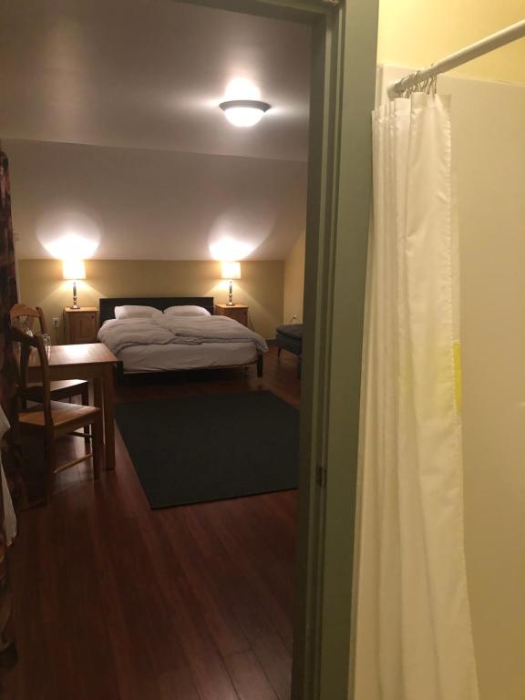 Postel nebo postele na pokoji v ubytování Crowsnest Vineyards Guesthouse