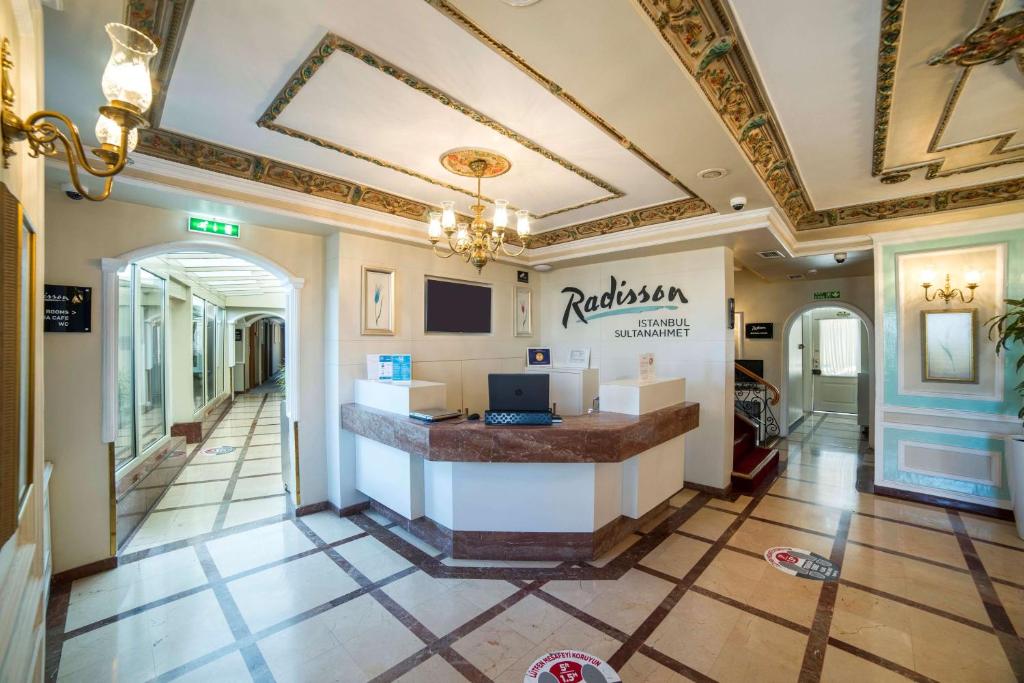 A television and/or entertainment centre at Radisson Hotel Istanbul Sultanahmet
