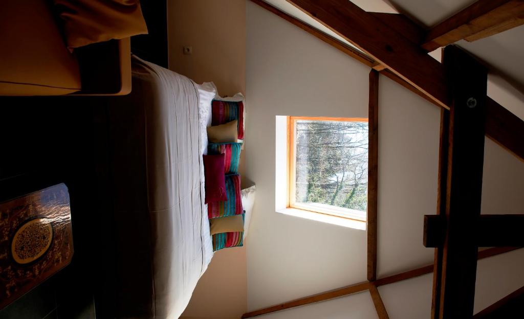 Palanda nebo palandy na pokoji v ubytování B&B Hippo-Droom