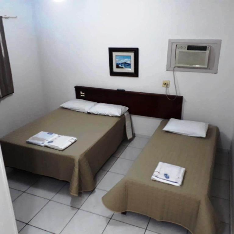 Postel nebo postele na pokoji v ubytování Hotel Fratelli