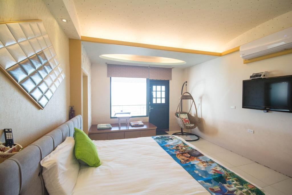 TV a/nebo společenská místnost v ubytování Lanyang Beach Villa