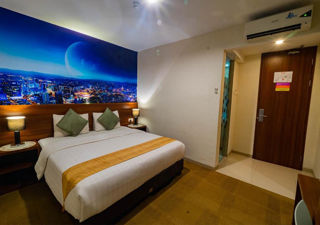 Postel nebo postele na pokoji v ubytování Miyanna Hotel