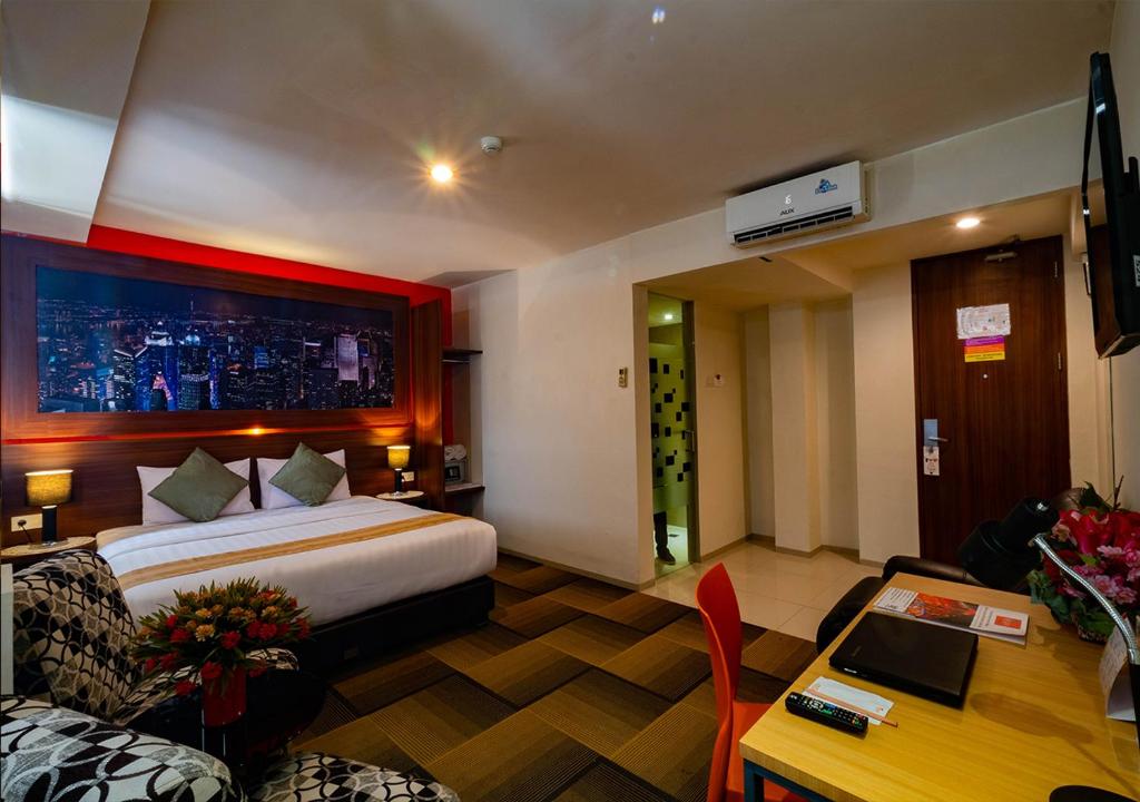 Postel nebo postele na pokoji v ubytování Miyanna Hotel