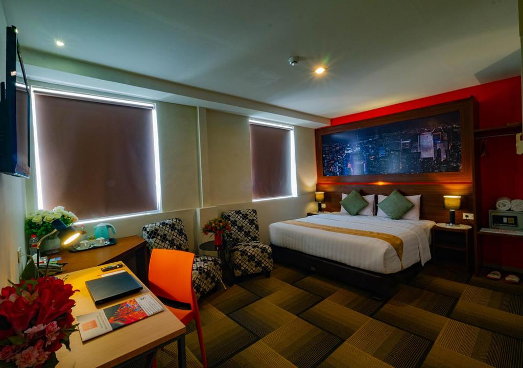 Postel nebo postele na pokoji v ubytování Miyanna Hotel