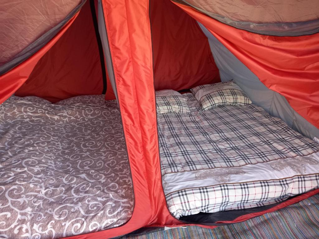 Postel nebo postele na pokoji v ubytování Camping Nad Karpatamy SPA