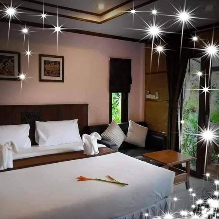 Postel nebo postele na pokoji v ubytování Seabreeze Hotel Kohchang