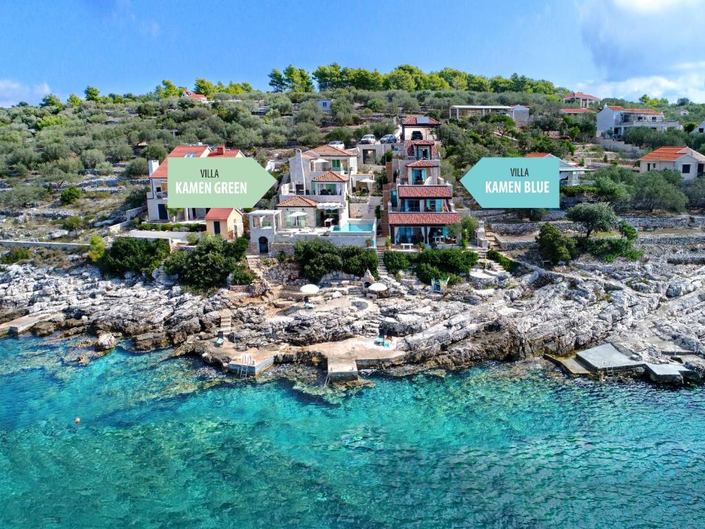 an aerial view of a villa on the water at Villa Kamen Green in Vela Luka