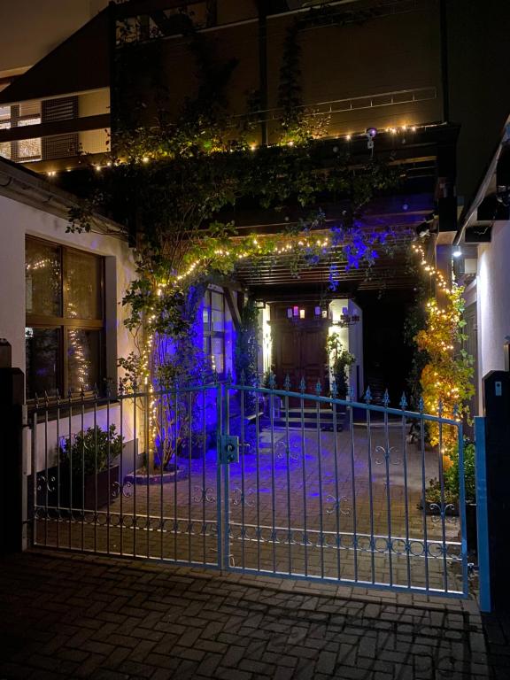 an entrance to a building at night with lights at Wieko Ferienwohnungen in Plauen