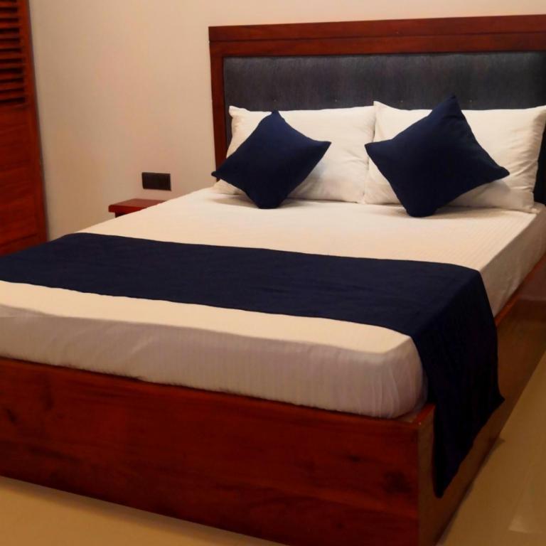 Postel nebo postele na pokoji v ubytování Kudila Resort