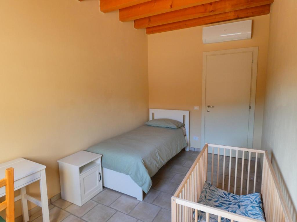 Posteľ alebo postele v izbe v ubytovaní Agriturismo il Fontanile