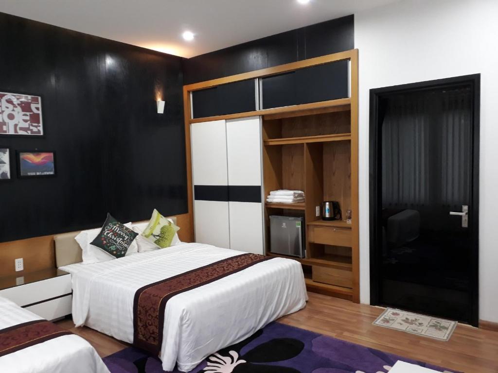 Postel nebo postele na pokoji v ubytování Đồi Sao Homestay