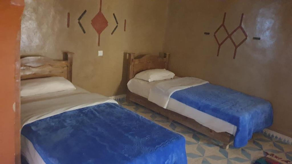 Cama o camas de una habitación en Kasbah Tamariste