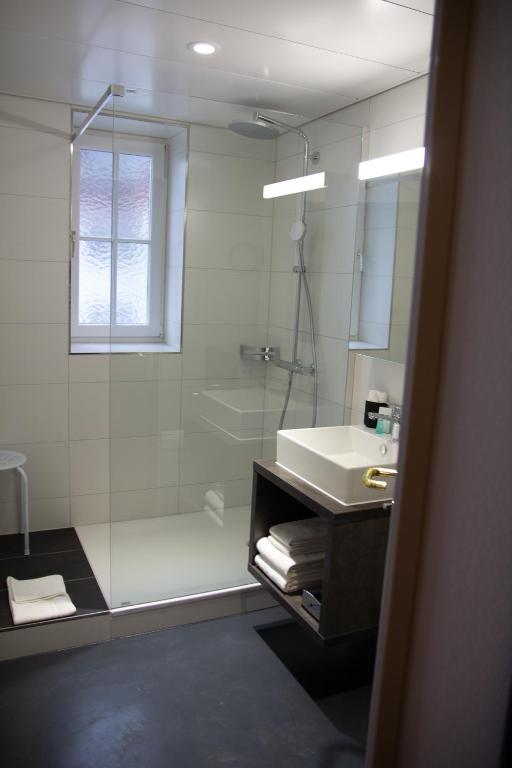 Un baño de Boutique City Hotel Gallo