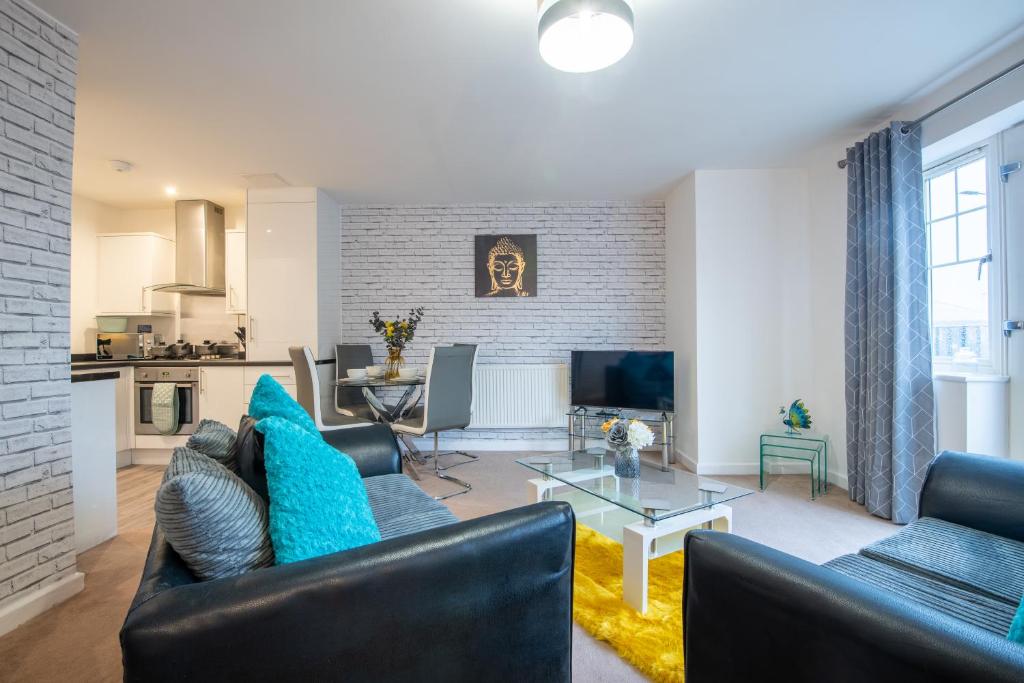 a living room with a couch and a table at No11 Nursery Covent in Mansfield