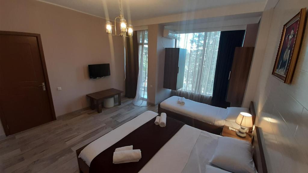Postel nebo postele na pokoji v ubytování Balu