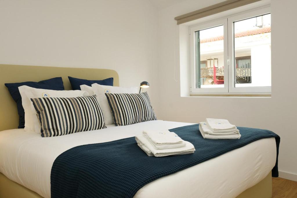 Postel nebo postele na pokoji v ubytování Love apartment Beco Torto, Cascais