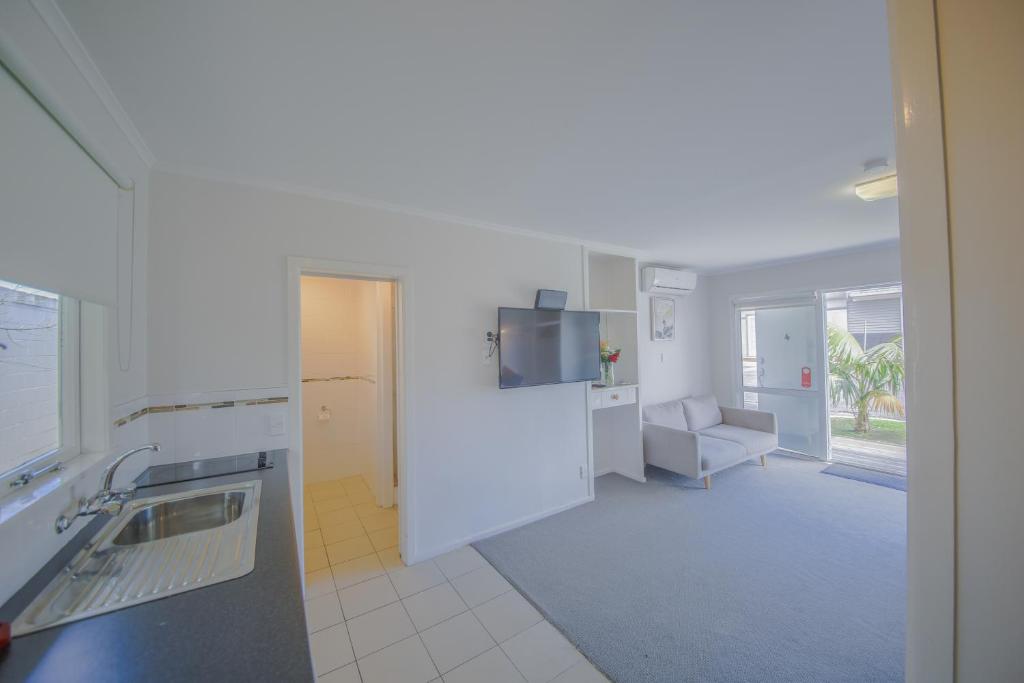 Kuchyň nebo kuchyňský kout v ubytování Sylvia Park Motel