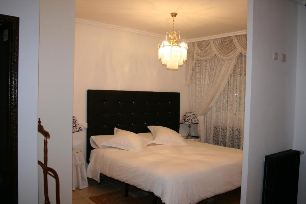 Posteľ alebo postele v izbe v ubytovaní Mirador del Ermitage