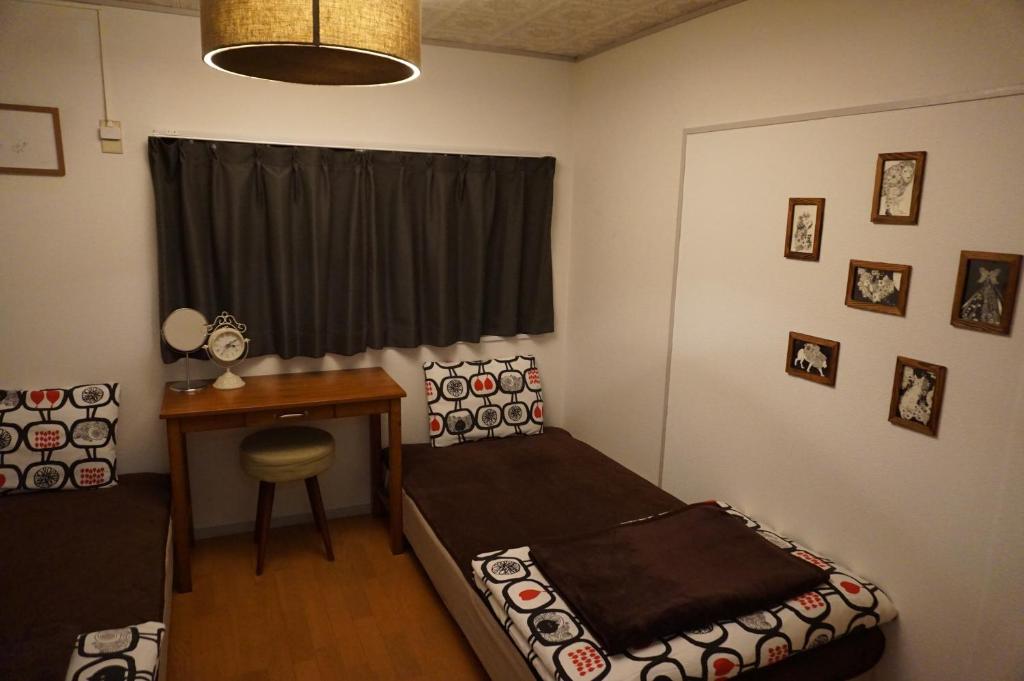 Postel nebo postele na pokoji v ubytování Guesthouse Ten-roku - Female Only