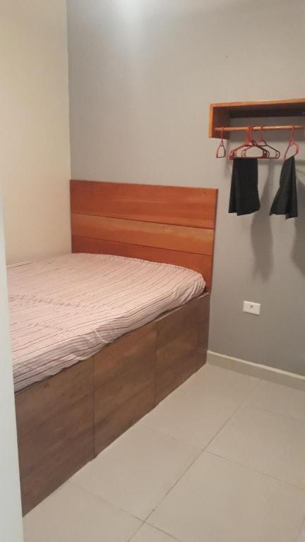 Krevet ili kreveti u jedinici u okviru objekta Lindo apartamento em Frente ao mar na Ilha Comprida