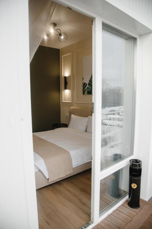 Postel nebo postele na pokoji v ubytování Dream Hotel