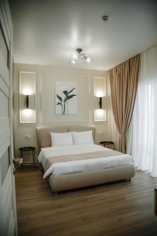 Postel nebo postele na pokoji v ubytování Dream Hotel