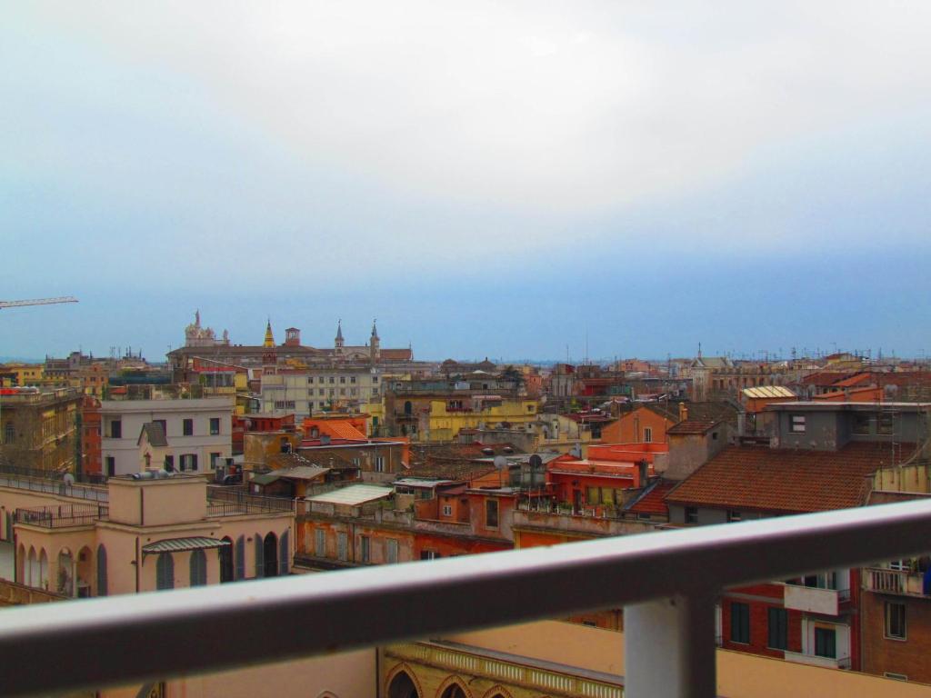 a view of a city from a balcony at Buonarroti Guest House in Rome